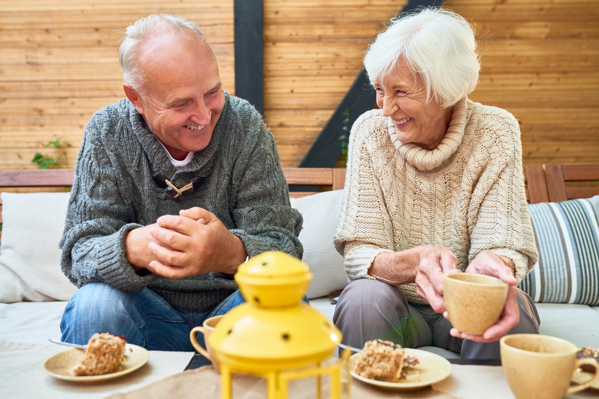 Happy retired couple discussing which Medigap Plan G Options they would like to go with.