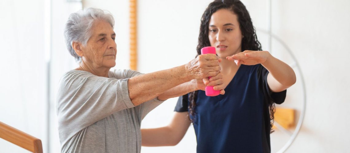Old lady on physical therapy